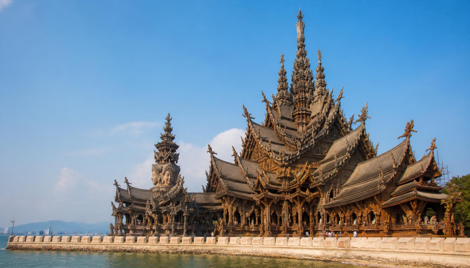 Carved teak Sanctuary of Truth temple on the seafront in Pattaya, Thailand